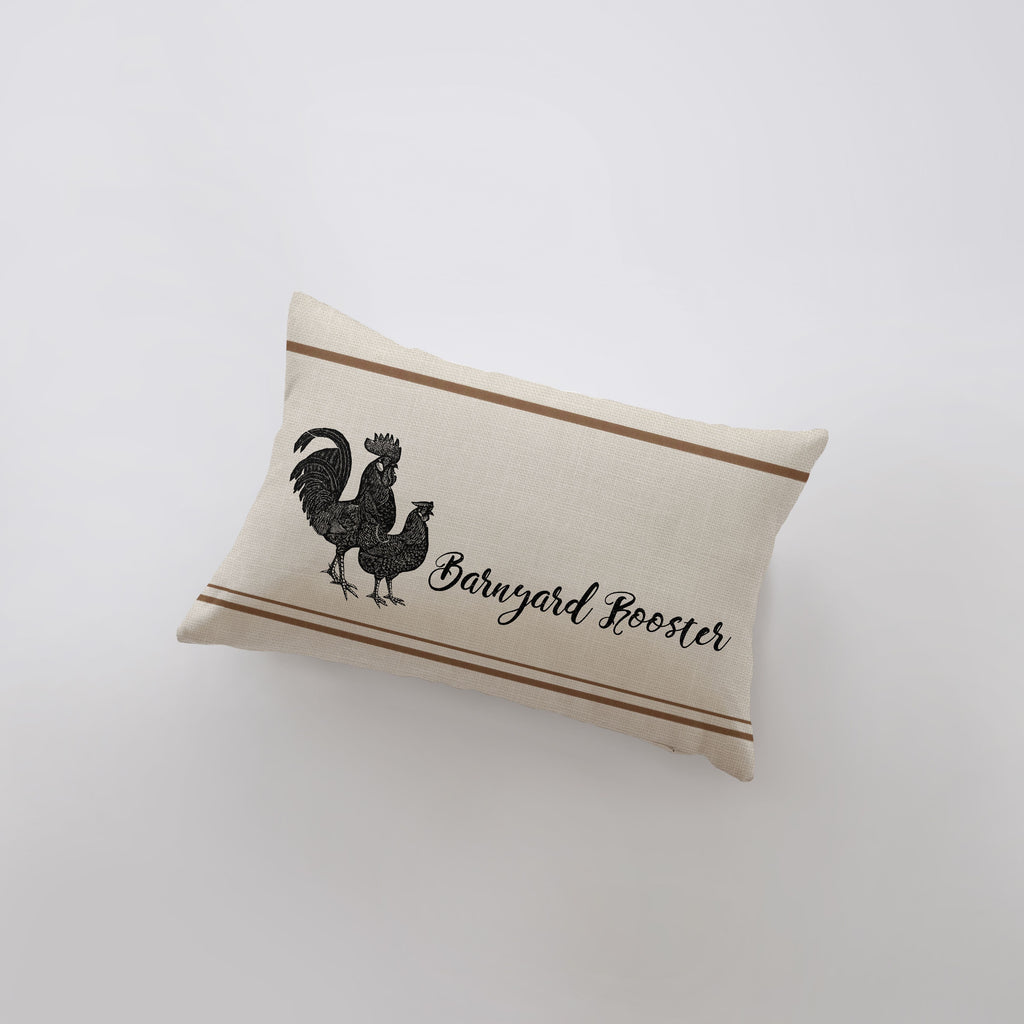 a pillow that has a rooster on it