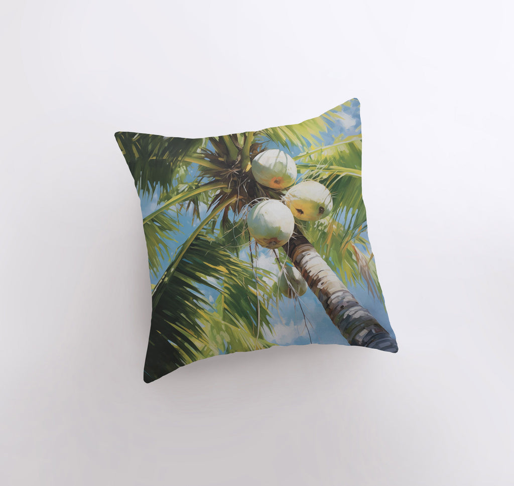 a pillow with a picture of a coconut tree