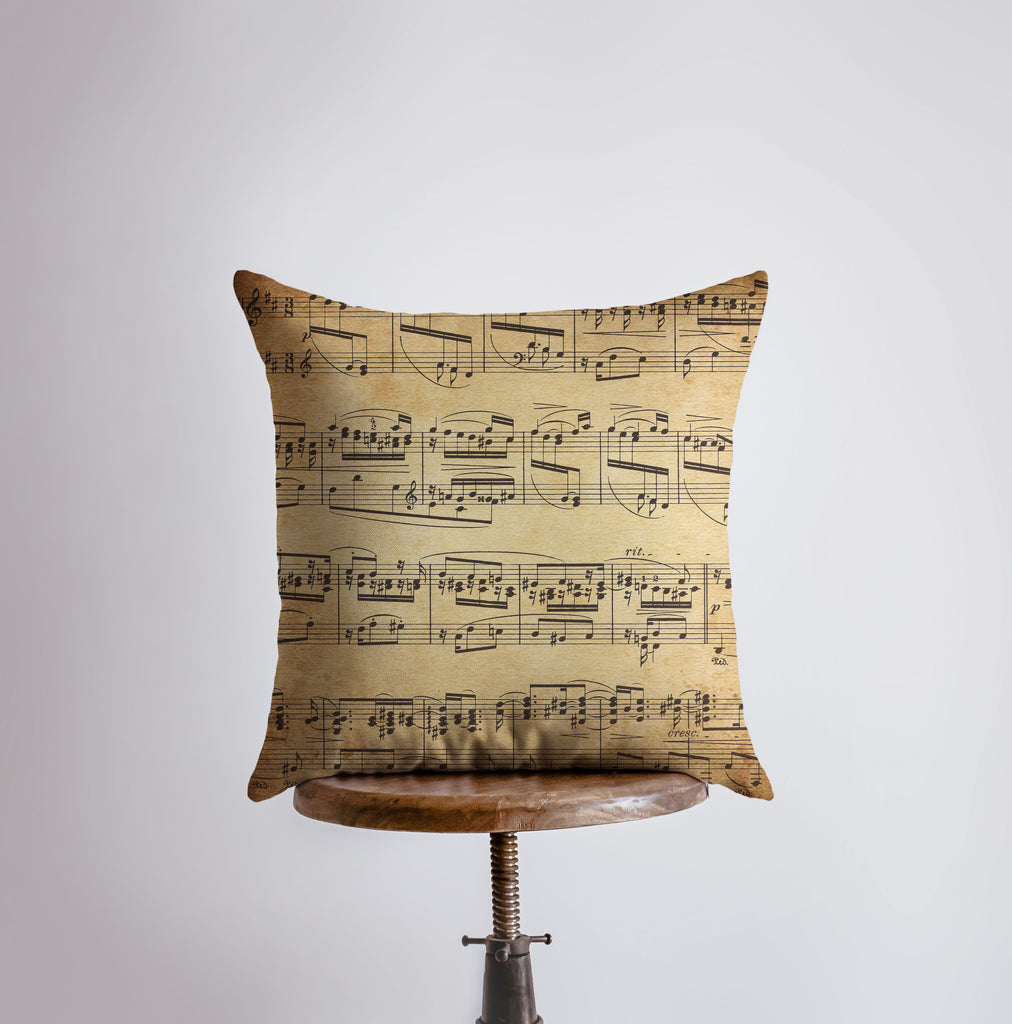 a pillow that has musical notes on it