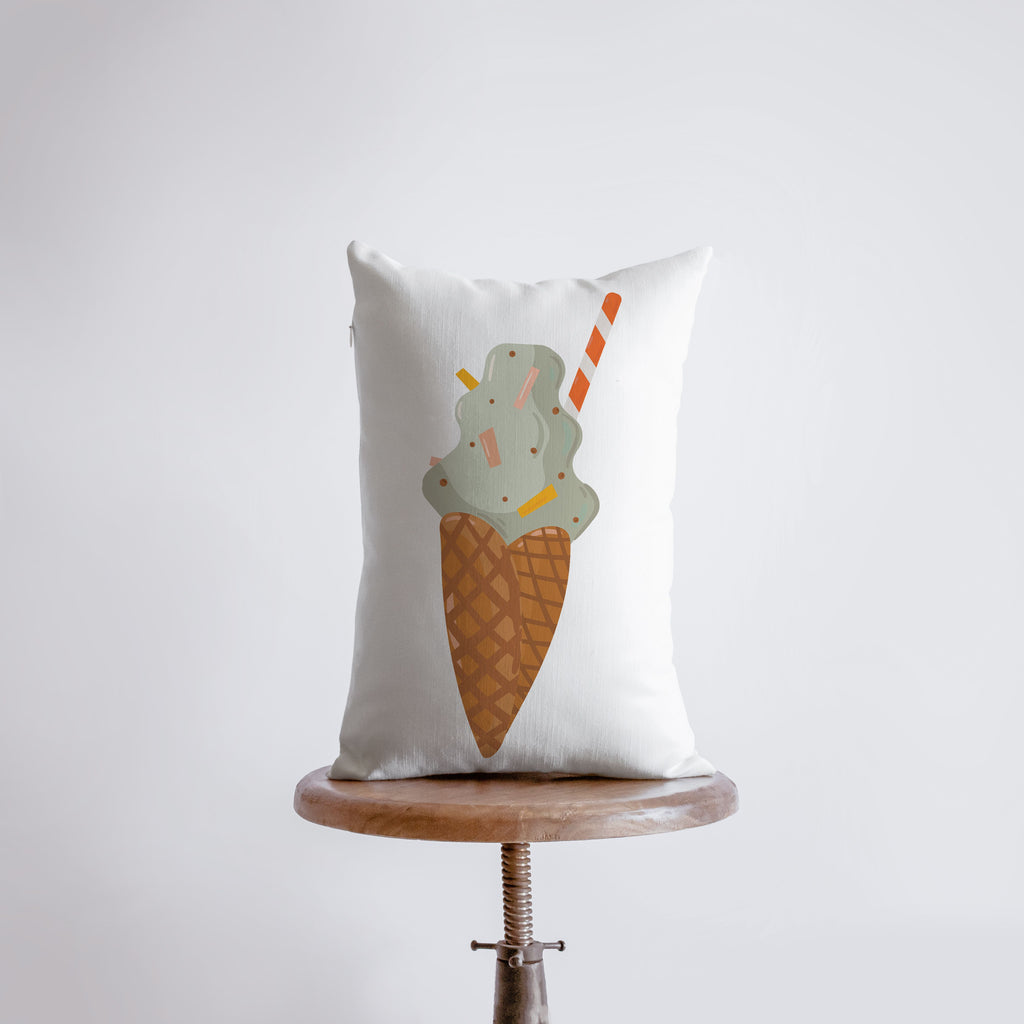 a pillow with an ice cream sundae on it