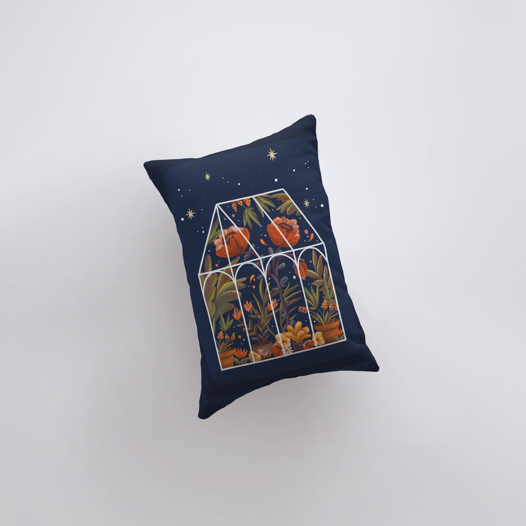 a pillow with a picture of a house on it