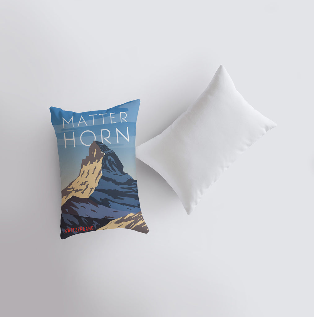 a pillow with a picture of a mountain on it