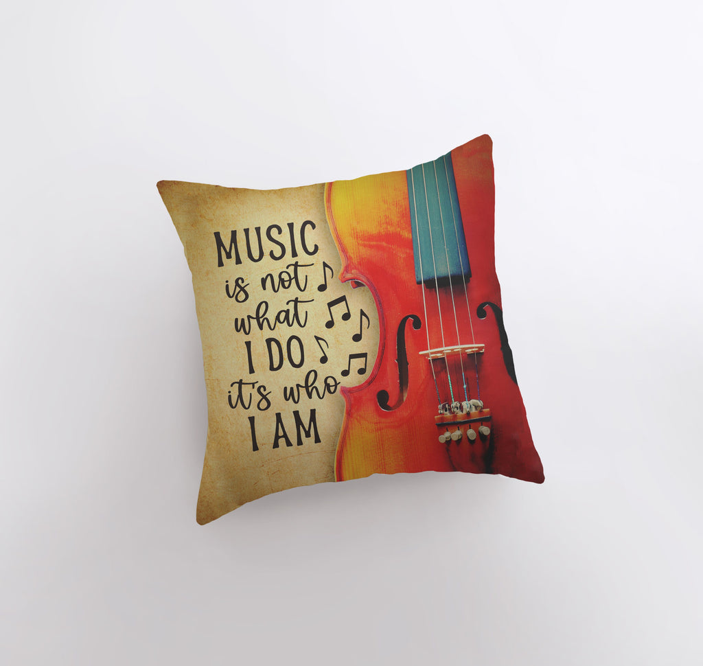 a pillow that has a violin on it