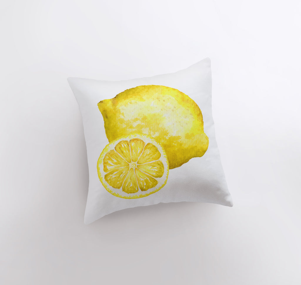 a pillow with a yellow lemon on it