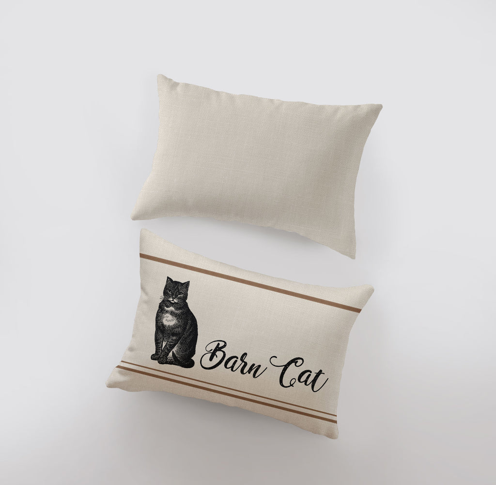 a pillow with a cat on it next to a pillow with a cat on it