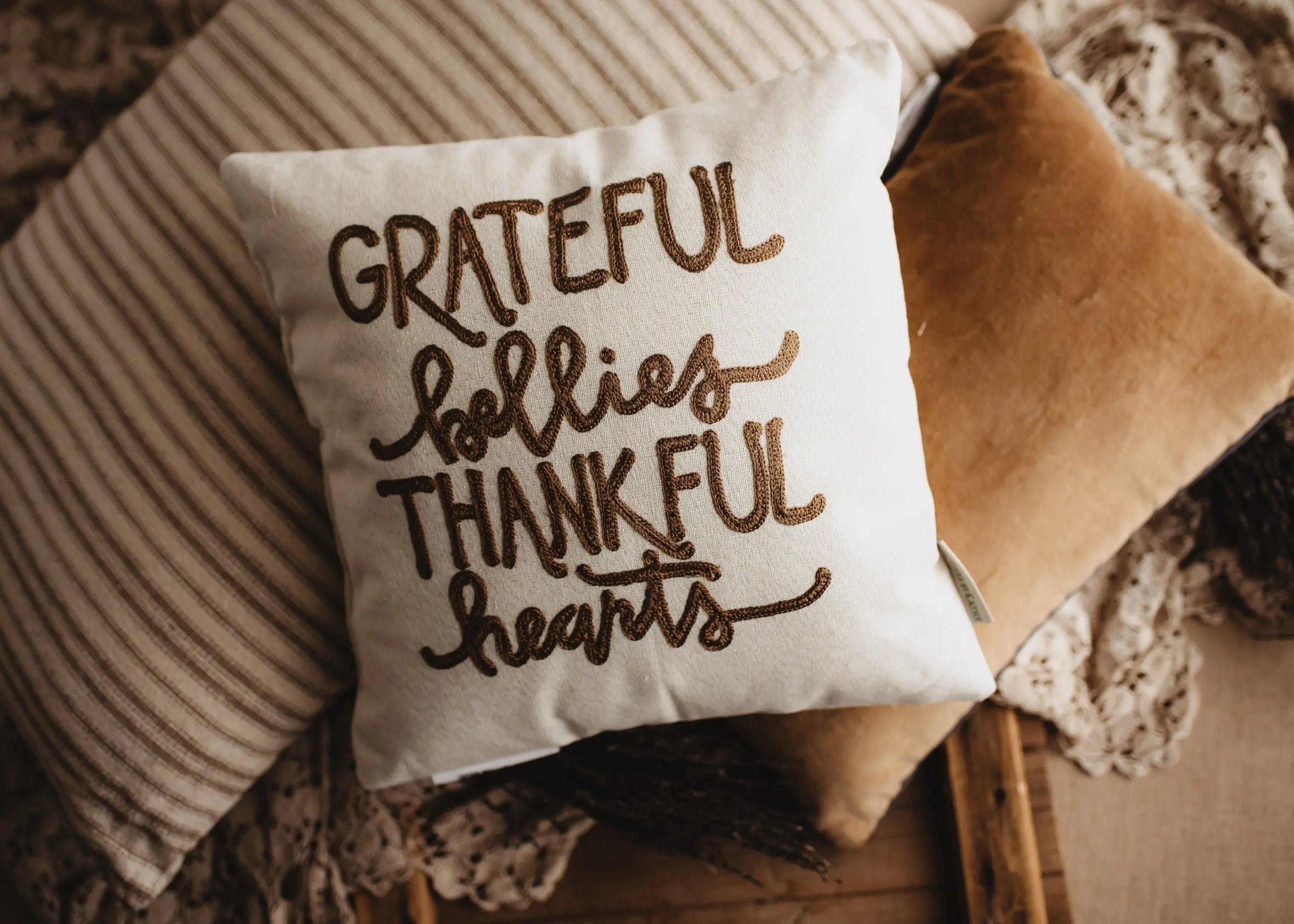 https://uniikpillows.com/cdn/shop/products/Grateful-Bellies-Thankful-Hearts-Pillow---Throw-Pillow-Thanksgiving-Decor---Fall-Decor---Room-Decor---Decorative-Pillow---Gift-for-her-UniikPillows-1680289559.jpg?v=1680289575